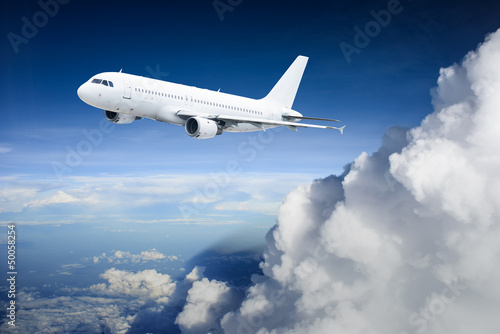 Fototapeta na wymiar Airplane in the sky - Passenger Airliner / aircraft