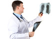 © Africa Studio - Medical doctor analysing x-ray image  isolated on white