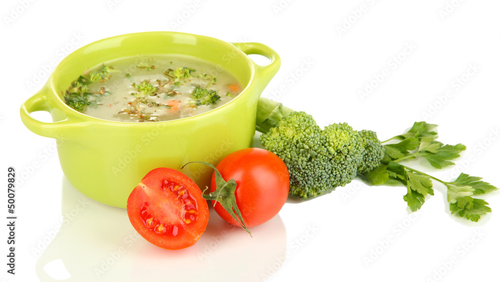 Diet soup with vegetables in pan isolated on white