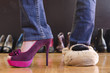 © grufnar - woman trying on shoes at home