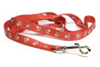 Dog lead or leash with paw print pattern on white.
