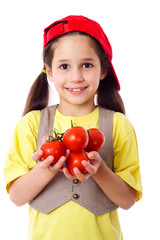 Wall Mural - Smiling girl with tomatoes