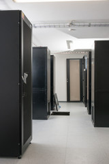 Poster - server cabinets inside data center room