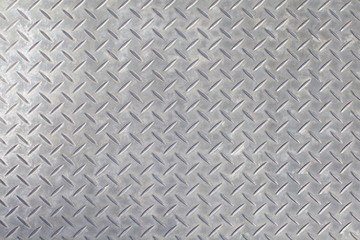 gray colored diamond plate background , White Background of old metal diamond plate in silver color background