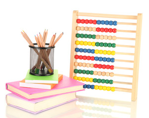 Bright wooden toy abacus, books and pencils, isolated on white
