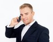 © GVS - happy successful young business man talking on cell phone