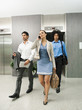 © Erik Isakson/Blend Images - Business people leaving elevator
