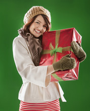 Mixed Race Woman Holding Christmas Gift