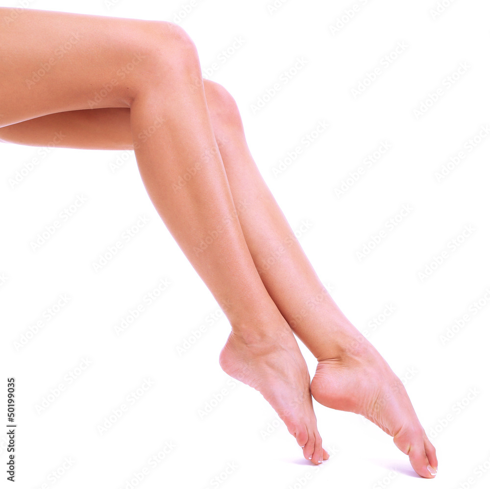 Beautiful woman legs, isolated on white
