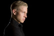 © lichtmeister - Profile low key portrait of attractive man.