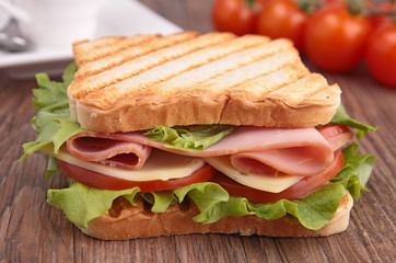 Poster - sandwich on wood background