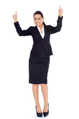 Wall Mural - Business woman standing and showing thumbs up gesture