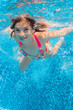 © Iuliia Sokolovska - Underwater child in swimming pool, girl swims and having fun