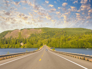 Canvas Print - Beautiful road on the lake with sunset colors