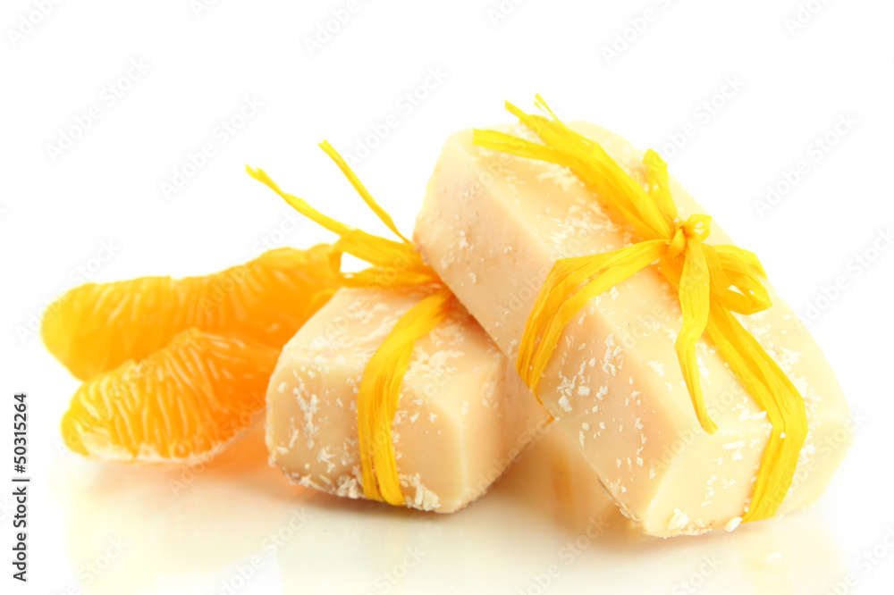 Natural handmade soap and orange, isolated on white