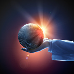 Wall Mural - image of earth planet on hand