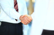 © yurolaitsalbert - handshake isolated on business background
