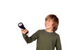 © Gelpi - Child with a flashlight looking for something