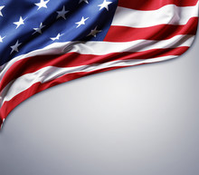 American Flag On Grey Background. Copy Space