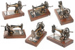 Set of sewing-machines on white background