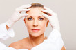© michaeljung - skin check before cosmetic surgery