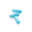 Blue medical capsule on white, clipping path included