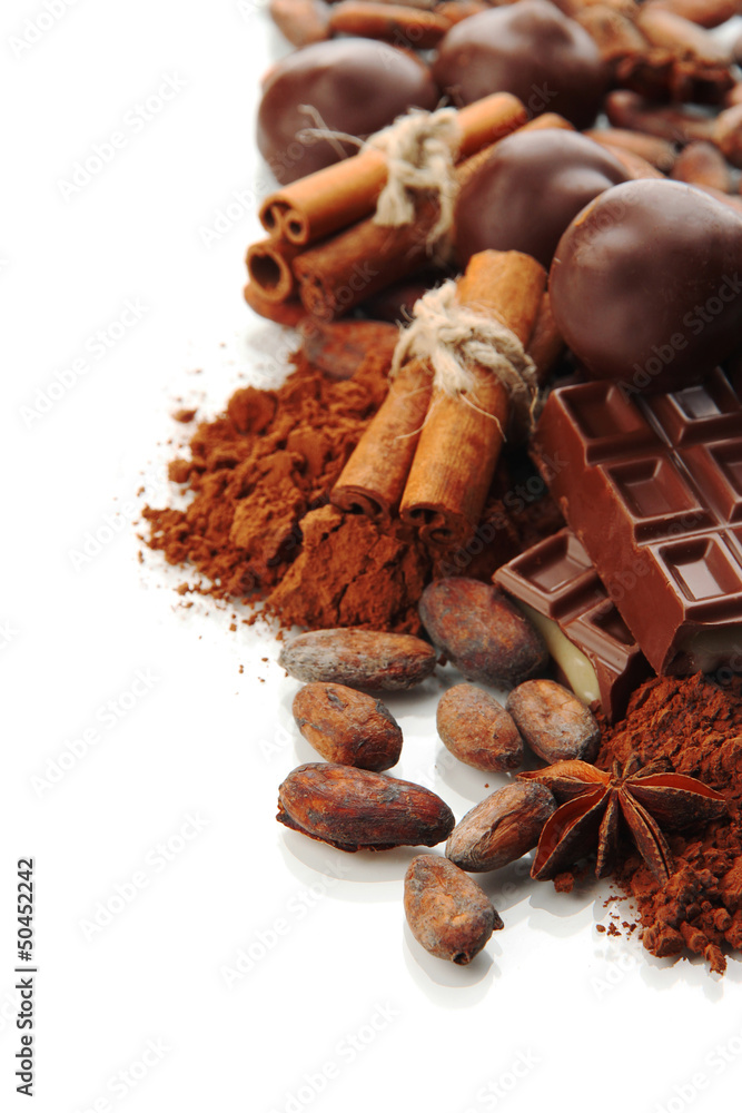 Composition of chocolate sweets, cocoa and spices, isolated