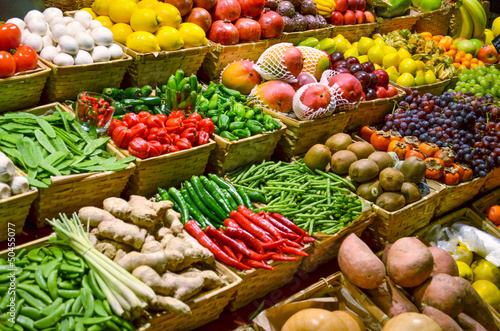 Fotografía Fruit market with various colorful fresh fruits and vegetables