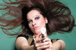 © anetlanda - Sexy young woman long hair - gun