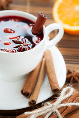 Wall Mural - mulled wine with cinnamon and spices