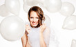 Smiled happy bride in  white balloons