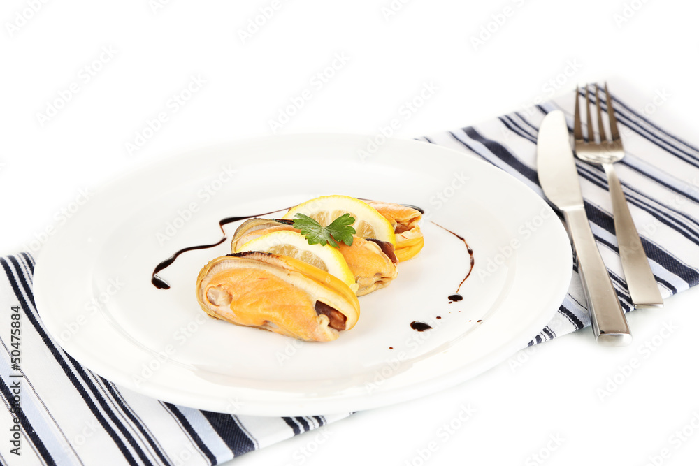 Mussels with sauce on plate isolated on white