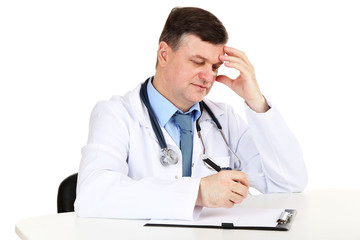 Poster - Medical doctor working at desk isolated on white