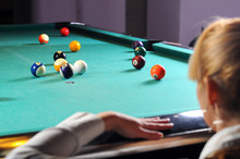 Young Girl Playing Snooker