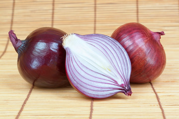 Group of vegetables fresh onion cut in the bamboo napkin.