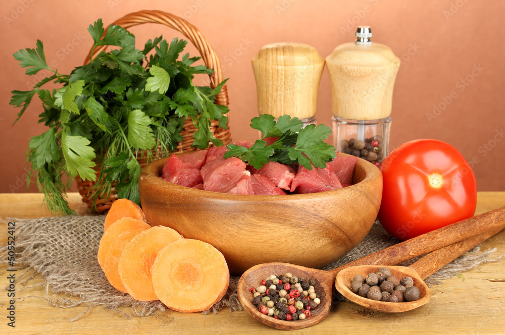 Raw beef meat with herbs and spices