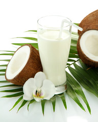 Wall Mural - Coconuts with glass of milk, isolated on white