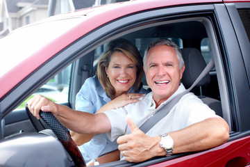 Happy senior couple in the car.