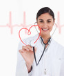 © WavebreakmediaMicro - Happy doctor holding up stethoscope to red heart design