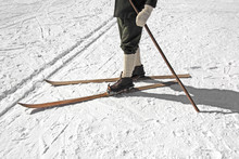 Old wooden skis and leather ski boots