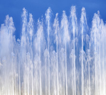 Fountain On Blue Sky