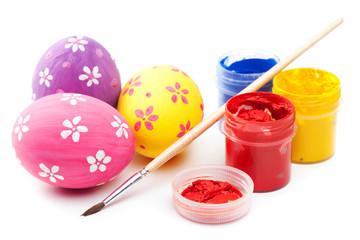 Wall Mural - easter eggs with paints and paintbrush on white