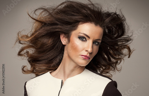 Naklejka - mata magnetyczna na lodówkę Beauty brunette with long hair