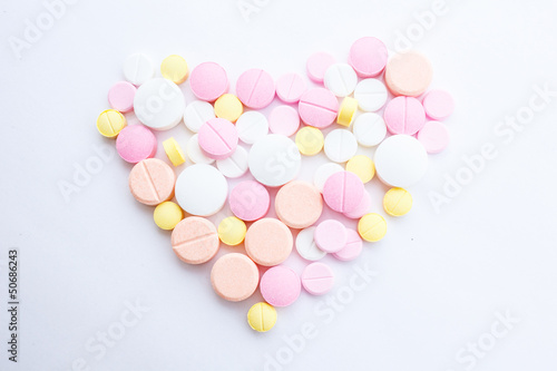 Fotografia, Obraz Drugs that are arranged in a heart shape