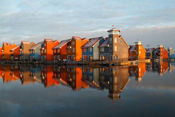 Fototapete - colorful buildings at Reitdiephaven in morning sunlight