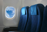 Fototapeta Sypialnia - airplane seat and window