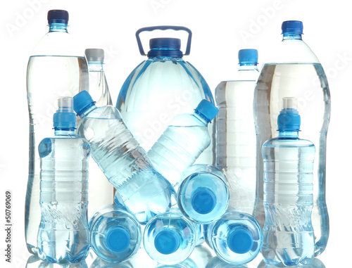 different water bottles isolated
