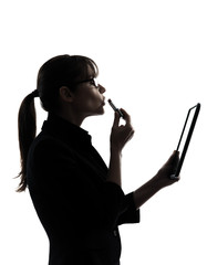 Wall Mural - business woman applying lipstick computer computing  digital tab