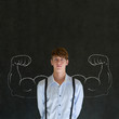 © StockMasters - Man with chalk healthy strong arm muscles for success