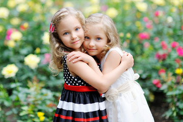 Sticker - portrait of two sisters twins in the summer